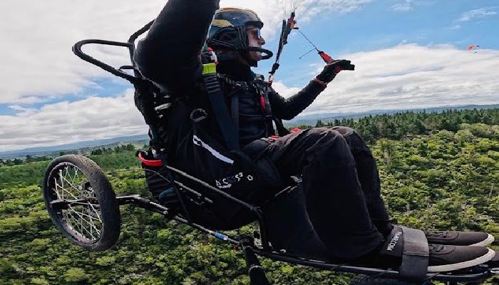 Ajmal Samuel, a Hong Kong-based special athlete of Pakistani origin, pilots his paraglider. — Supplied