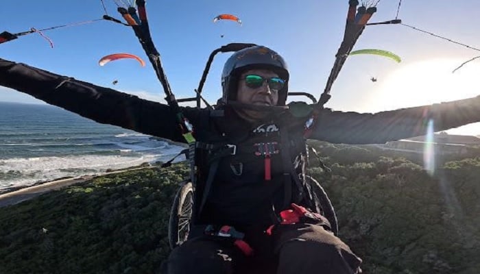 Ajmal Samuel, a Hong Kong-based special athlete of Pakistani origin, pilots his paraglider. — Supplied