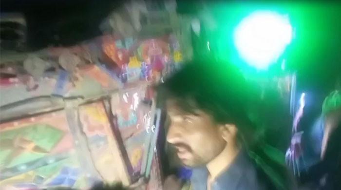 At least 13 killed as truck carrying pilgrims to Shah Noorani shrine falls into ditch