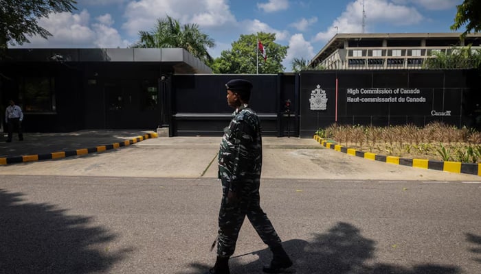 A security personnel patrols outside the Canadian High-Commision in New Delhi, India September 19, 2023. — Reuters