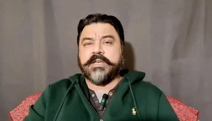 Major (retd) Adil Farooq Raja speaking in his vlog in this undated image. — YouTube
