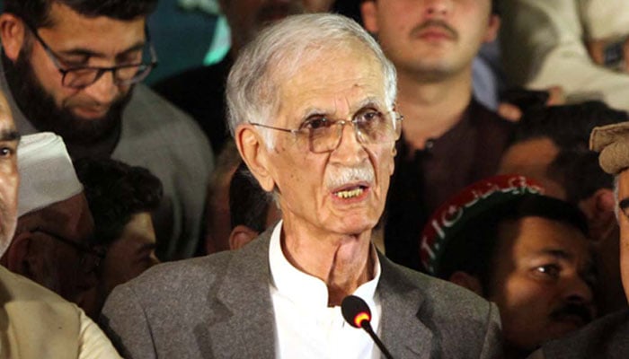 Former Khyber Pakhtunkhwa chief minister Pervez Khattak addressing a public gathering in this undated picture. — PPI/File