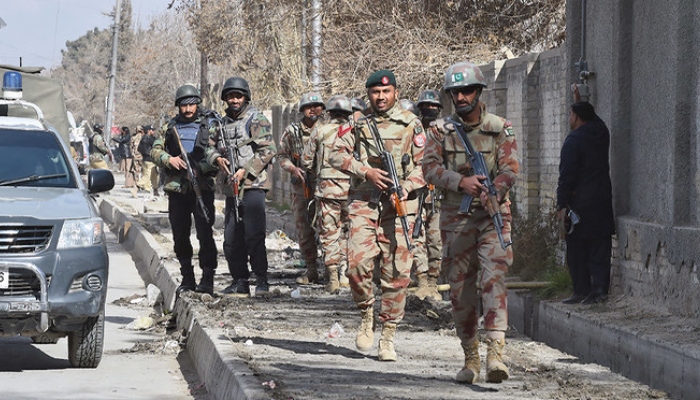 Security personnel take position after suicide bombers attacked a Methodist Church during a Sunday service in Quetta on December 17, 2017. —AFP