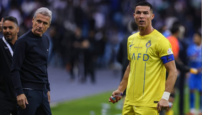 Luís Castro (L) became manager of Al Nassr in July 2023, after Cristiano Ronaldo joined team. — AFP