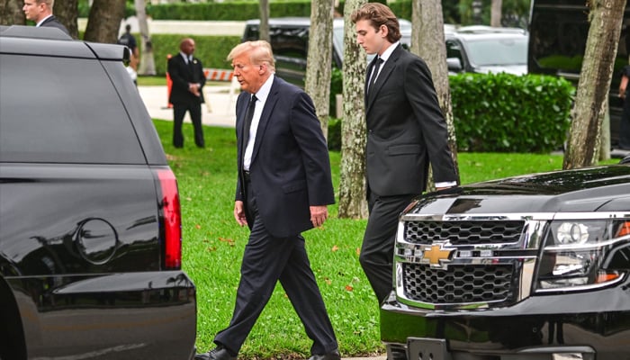 Donald Trump's youngest son Barron Trump (R) is set to graduate in May.  — AFP/File