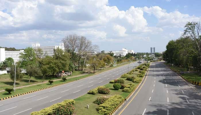 This representational image shows an empty road on Constitution Avenue in Islamabad on April 21, 2023. — Online