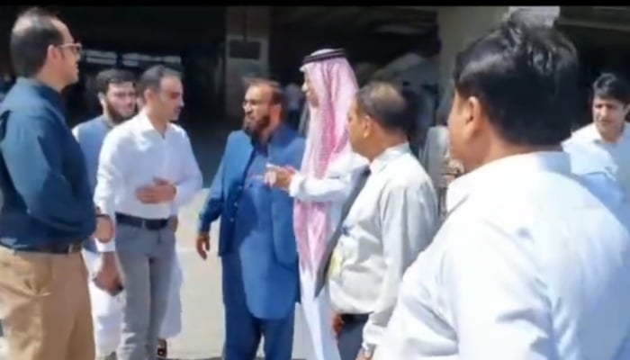 The still shows the Karachi airport authorities talking with the Saudi Arabian delegation andSaudi Consul General in Karachi Faleh Al-Rehaili at theJinnah International Airport (JIAP) in the video released on April 21, 2024. —Facebook/Pakistan Civil Aviation Authority