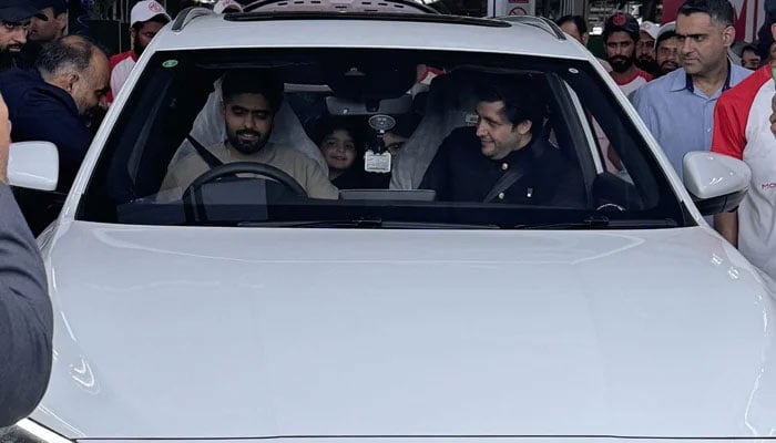 Peshawar Zalmi Javed Afridi (right) gifts car to skipper Babar Azam. —Javed Afridi/Instagram.