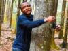 Ghana environmentalist hugs over 1,100 trees in an hour to smash world record