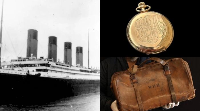 Who were owners of gold pocket watch, violin bag sold at Titanic auction? Who were owners of gold pocket watch, violin bag sold at Titanic auction?