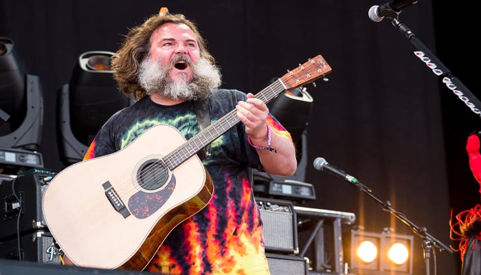 Jack Black breaks a sweat during Manchester rock performance