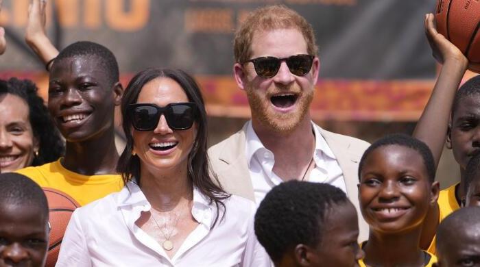 Meghan Markle pushes Prince Harry into the background