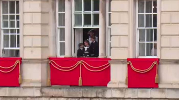 Kate Middleton peaks through Palace balcony, watches birthday parade with kids