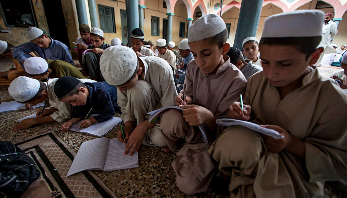 Students attend a lesson at Darul Uloom Haqqania, an Islamic seminary and alma mater of several Taliban leaders, in Akora Khattak, Pakistan. — Reuters/File