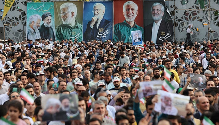 Banners of presidential candidate Saeed Jalili ​are displayed during a campaign event in Tehran, Iran on June 24, 2024. — Reuters