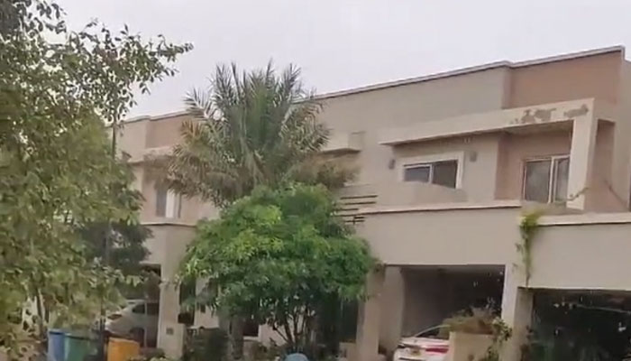 Rain in Karachis Bahria Town housing society on June 27, 2024. — Screengrab/Geo News