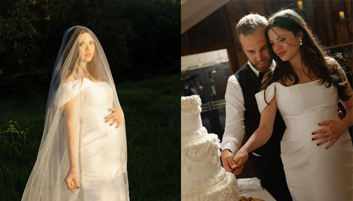 Morgan exuded grace in an off the shoulder gown and a handmade veil from Etsy