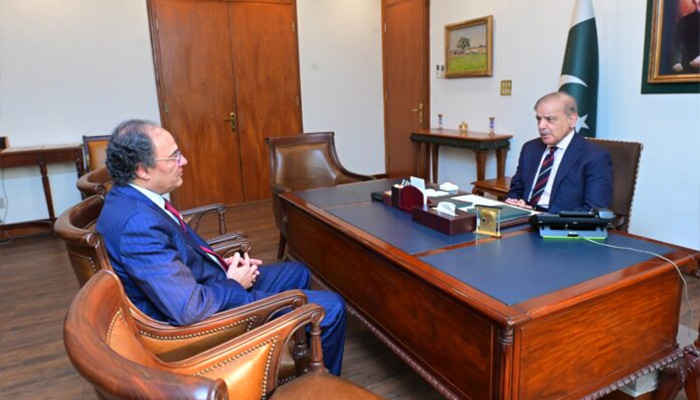 Finance Minister Muhammad Aurangzeb (left) calls on Prime Minister Shehbaz Sharif after budget approval in the National Assembly. — APP