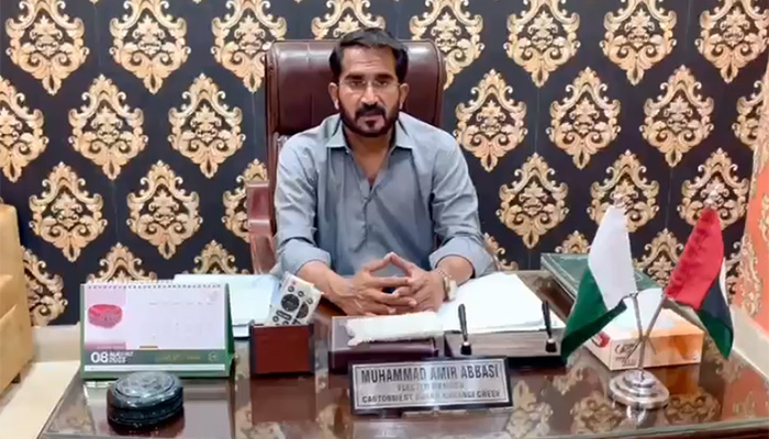 PPP councillor Muhammad Amir Abbasi can be seen in this screengrab taken from a video. — Reporter