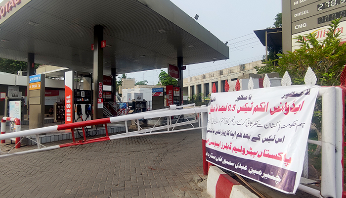 A sign that shows the petrol dealers reservation against the government as the petrol pump remains closed due to the strike in Karachi on July 5, 2024. — Geo.tv