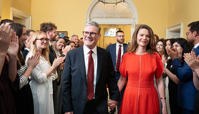 Newly elected UK Prime Minister Keir Starmer and his wife Victoria Starmer are clapped in by staff as they enter his official London residence at No 10 Downing Street for the first time after the Labour Party won a landslide victory at the 2024 General Election, in London, Britain, July 5, 2024. — Reuters