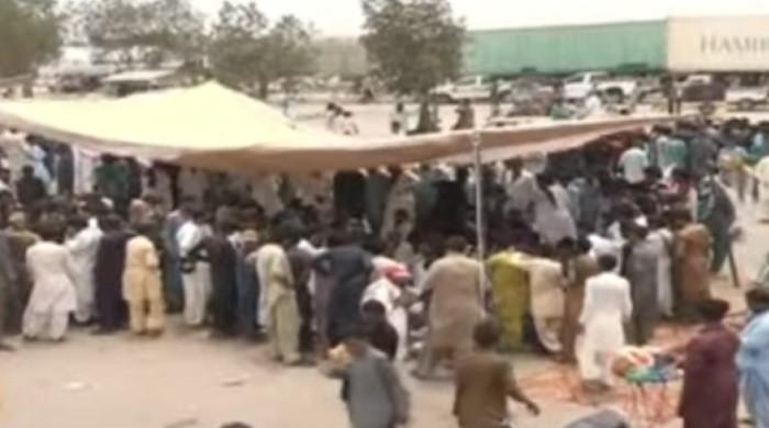 Protest ends as police offer judicial probe into woman's death by Karachi cops' firing