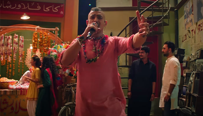 Pakistani rapper and songwriter Faris Shah can be seen singing in this still taken from the official music video of the song Blockbuster from Coke Studio Pakistans season 15. — Screengrab/YouTube/Coke Studio Pakistan