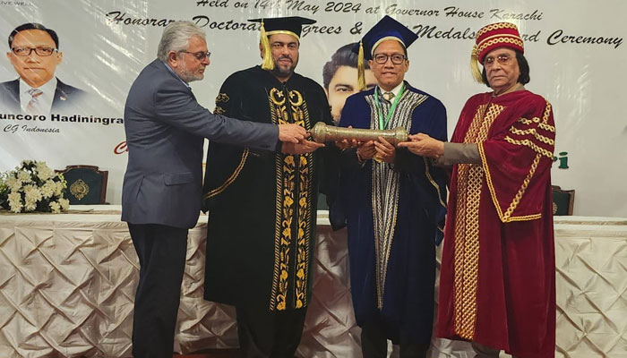 Sindh Governor Kamran Khan Tessori (second from left) awards Honourary Doctorate and Gold Medal to Indonesian Consul General Dr June Kuncoro Hadiningrat (second from right) in this image taken on May 14, 2024. — Supplied