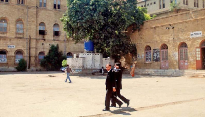 Lawyers walk in City Court’s premises in Karachi in this undated photo. — PPI