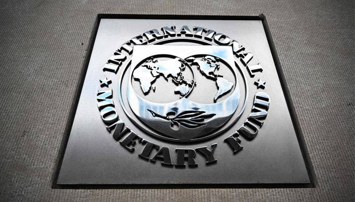 The seal of the International Monetary Fund is at the headquarters building in Washington, DC, on April 12, 2024. — AFP