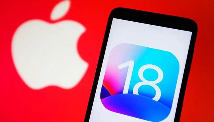 This representational image shows the Apples iOS 18 logo displayed on a phone screen. — AFP/File