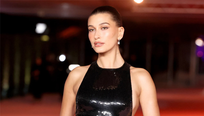 Hailey Bieber flaunts her baby bump as she turns towards a new fragrance