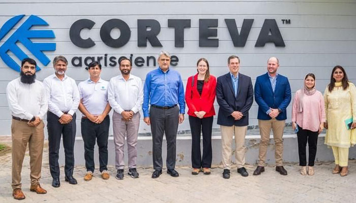 DCM Schofer (fourth to right) pictured with other officials and staff at the Corteva Agriscience research facility. — Supplied/File