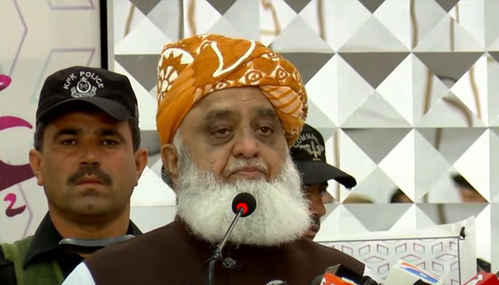 Jamiat Ulema-e-Islam Fazl chief Maulana Fazlur Rehman addresses a traders convention in Peshawar on August 11, 2024. — Screengrab/GeoNews