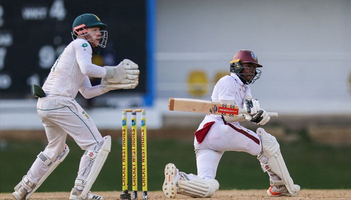 Alick Athanaze of West Indies and Kyle Verreynne of South Africa during day 5 of the 1st test match between West Indies and South Africa at Queen´s Park Oval on August 11, 2024 in Port of Spain, Trinidad and Tobago. — AFP