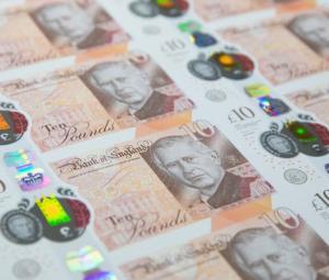 First of Britain's new banknotes sell for over £900k in record auction