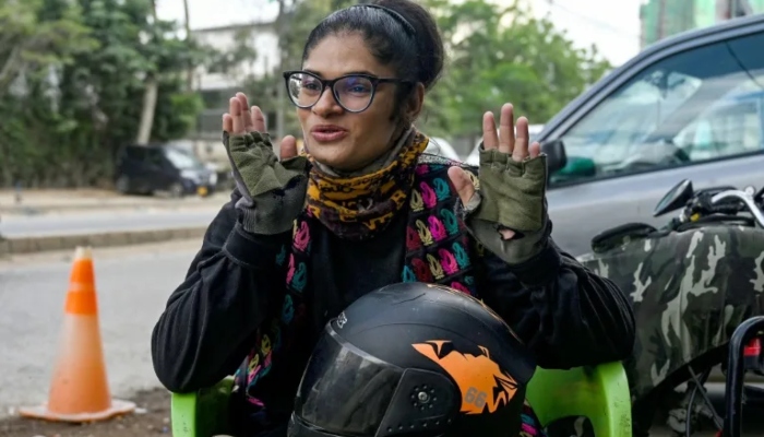 Amina Sohail, motorcycle rider in Karachi. —AFP/ File