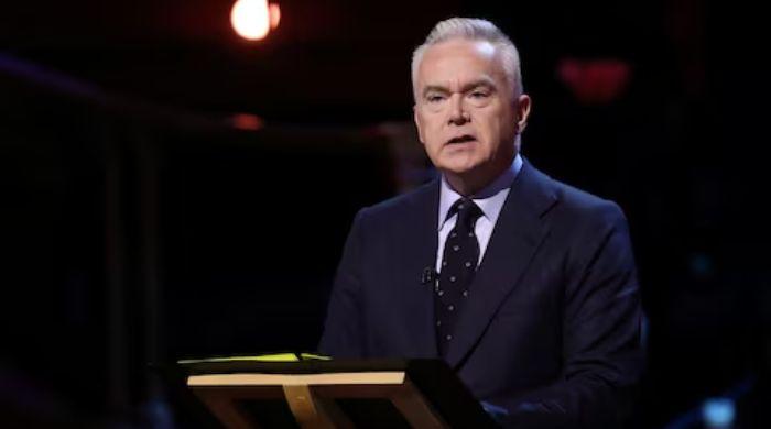 Ex-BBC presenter Huw Edwards given suspended sentence for indecent child images