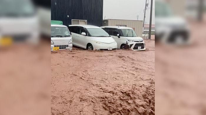 Japan issues evacuation orders after rains trigger floods in quake-hit area