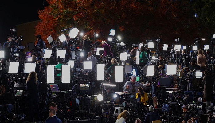 Members of the media work at the venue of Kamala Harris rally at Howard University, in Washington. — Reuters
