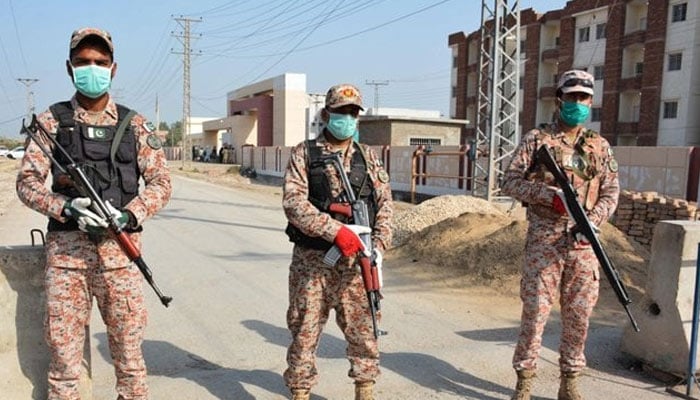 A representational image of Sindh Rangers standing guard at a site in Karachi. — AFP/File