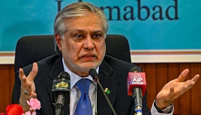 Deputy PM and Foreign Minister Ishaq Dar speaks to the media in this undated image. — AFP
