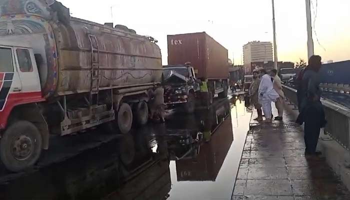 Oil spillage from a tanker  on Karachis busy Native Jetty Bridge can be seen on December 7, 2024 in this still taken from a video. — Reporter