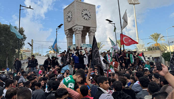 People celebrate, after Syrian rebels announced that they have ousted Syrias Bashar al-Assad, in Beirut, Lebanon December 8, 2024. — Reuters