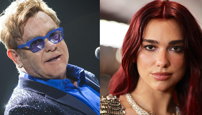 Elton John escorted onstage for duet with Dua Lipa amid health struggles