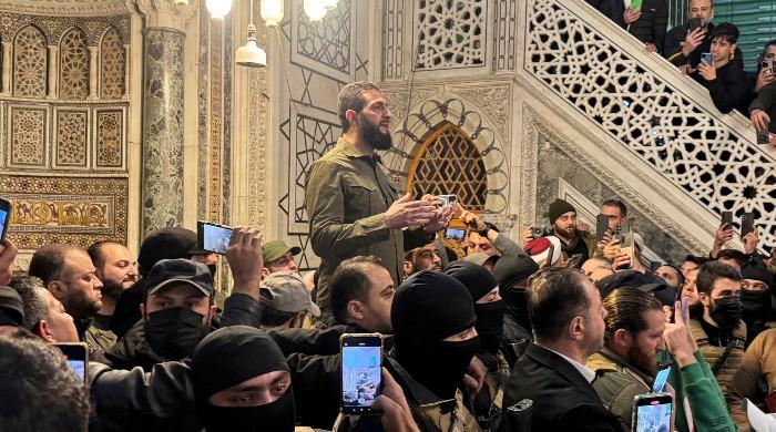 Syria's rebel leader vows to dissolve Assad regime security forces, close prisons