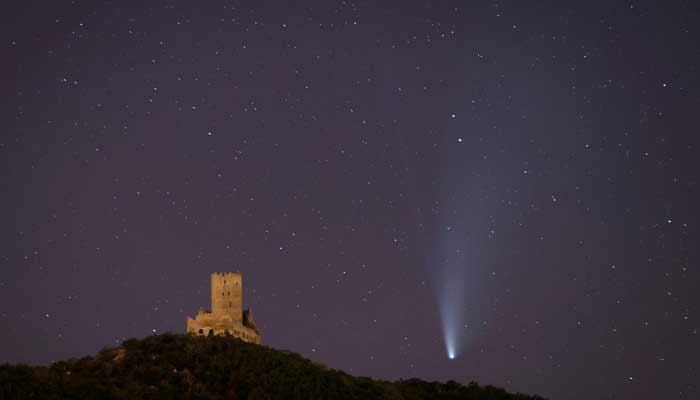 The Comet C/2020 or Neowise is seen in the sky over Ortenbourg castle, near Scherwiller, France. — Reuters/File