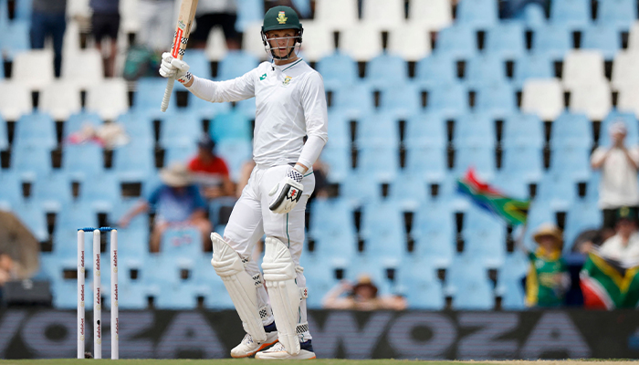 South Africa´s Corbin Bosch celebrates after scoring a half-century (50 runs) during the second day of the first cricket Test match between South Africa and Pakistan at SuperSport Park in Centurion on December 27, 2024. — AFP