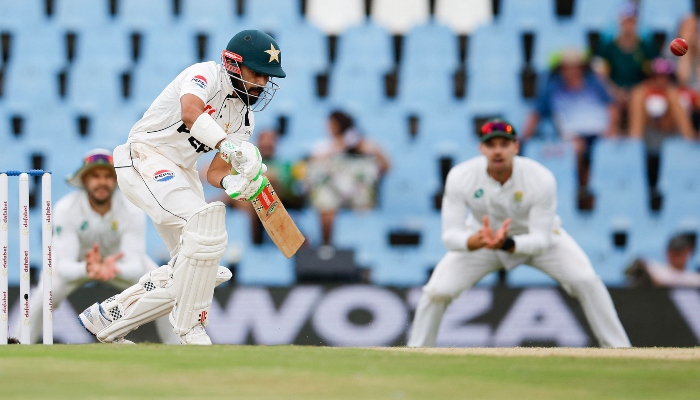 Saud Shakeel plays a shot during the second day of the first cricket Test match between South Africa and Pakistan at SuperSport Park in Centurion on December 27, 2024. —AFP