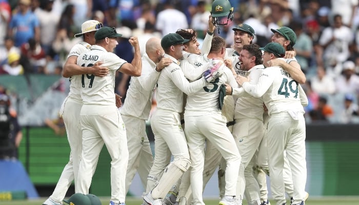 Australian players celebrate the last wicket on day five of the fourth Test between Australia and India at the Melbourne Cricket Ground (MCG) in Melbourne on December 30, 2024. — AFP